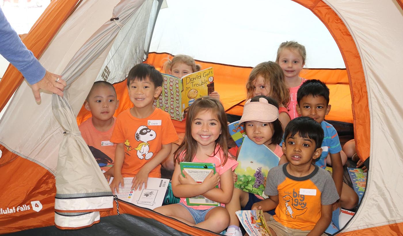 group of students in a tent group of students in a tent